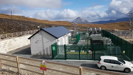 Overlooking shot of Keeldrum Windfarm 2 Donegal and a Powercomm car also in view on the bottom right of image